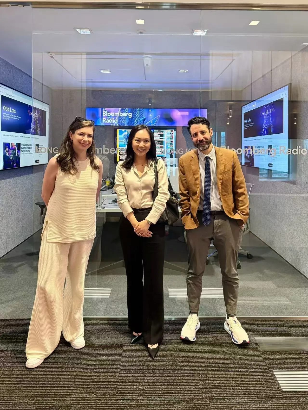 Grace Shao with Odd Lots hosts Tracy Alloway and Joe Weisenthal in the Bloomberg Radio studio
